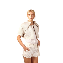 Load image into Gallery viewer, model in cropped denim jacket