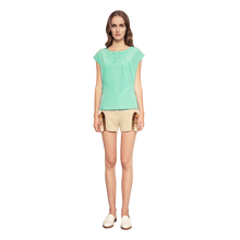 Load image into Gallery viewer, model wearing hand beaded crepe shorts 
